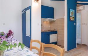 Kuchyň nebo kuchyňský kout v ubytování Apartment Kunfin V