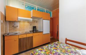 Kuchyň nebo kuchyňský kout v ubytování Apartment Kunfin V