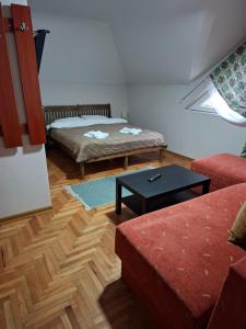 Postel nebo postele na pokoji v ubytování Hotel Koliba na Grza