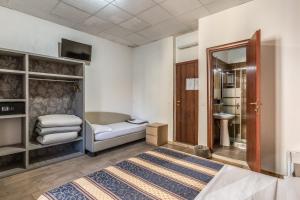 Postel nebo postele na pokoji v ubytování Hotel principe