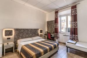 Postel nebo postele na pokoji v ubytování Hotel principe