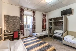 Postel nebo postele na pokoji v ubytování Hotel principe