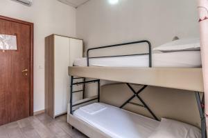 Postel nebo postele na pokoji v ubytování Hotel principe