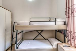 Postel nebo postele na pokoji v ubytování Hotel principe