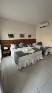 Postel nebo postele na pokoji v ubytování Apartamento em Resort Tree Bies