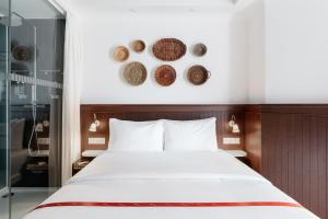 Rúm í herbergi á Ruby Molly Hotel Dublin