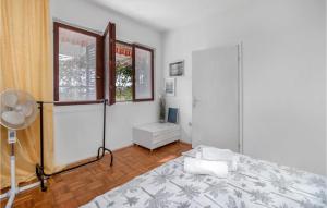 Posteľ alebo postele v izbe v ubytovaní Beautiful Apartment In Novi Vinodolski