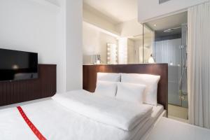Voodi või voodid majutusasutuse Ruby Hanna Hotel Stuttgart toas