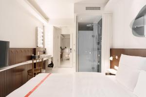 Voodi või voodid majutusasutuse Ruby Hanna Hotel Stuttgart toas