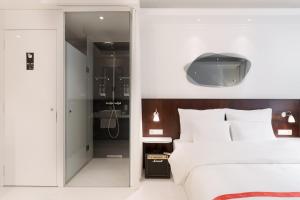 Voodi või voodid majutusasutuse Ruby Hanna Hotel Stuttgart toas