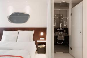 Voodi või voodid majutusasutuse Ruby Hanna Hotel Stuttgart toas