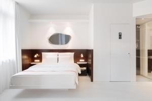 Voodi või voodid majutusasutuse Ruby Hanna Hotel Stuttgart toas