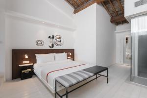 Llit o llits en una habitació de Ruby Bea Hotel Florence