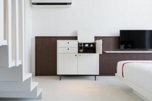 Llit o llits en una habitació de Ruby Bea Hotel Florence