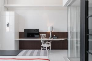 Llit o llits en una habitació de Ruby Bea Hotel Florence