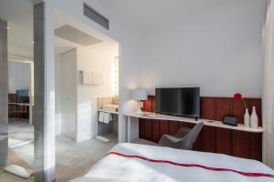 Postel nebo postele na pokoji v ubytování Ruby Marie Hotel Vienna