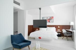 TV a/nebo společenská místnost v ubytování Ruby Marie Hotel Vienna
