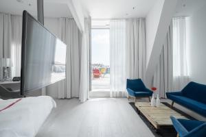 Postel nebo postele na pokoji v ubytování Ruby Marie Hotel Vienna