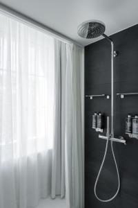 Ein Badezimmer in der Unterkunft Ruby Mimi Hotel Zurich