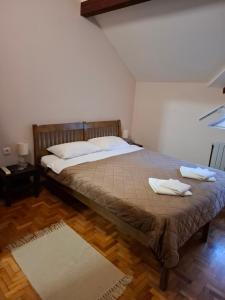 Postel nebo postele na pokoji v ubytování Hotel Koliba na Grza