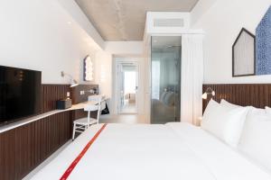 Voodi või voodid majutusasutuse Ruby Zoe Hotel London toas