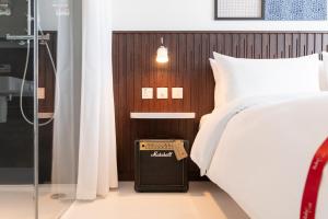 Voodi või voodid majutusasutuse Ruby Zoe Hotel London toas