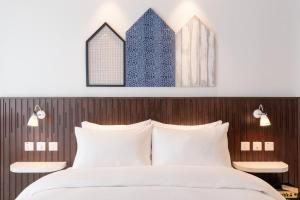 Voodi või voodid majutusasutuse Ruby Zoe Hotel London toas