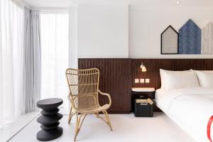 Voodi või voodid majutusasutuse Ruby Zoe Hotel London toas