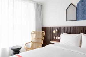 Voodi või voodid majutusasutuse Ruby Zoe Hotel London toas
