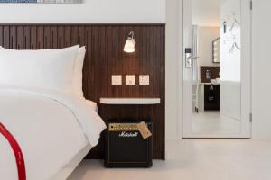 Voodi või voodid majutusasutuse Ruby Zoe Hotel London toas