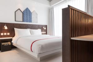 Voodi või voodid majutusasutuse Ruby Zoe Hotel London toas