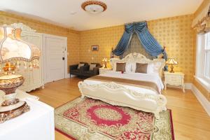 Llit o llits en una habitació de Prince inn 275 fotos més
