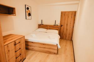 Postel nebo postele na pokoji v ubytování Hotel U Racka