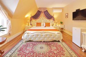 Llit o llits en una habitació de Prince inn