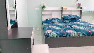 Postel nebo postele na pokoji v ubytování April Home
