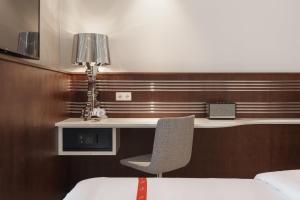 Letto o letti in una camera di Ruby Ella Hotel Cologne