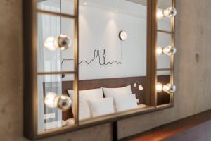 Letto o letti in una camera di Ruby Ella Hotel Cologne