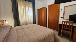 TV a/nebo společenská místnost v ubytování GH Hotel