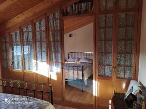 Katil atau katil-katil dalam bilik di Casa Lucila ,casa rural tres estrellas