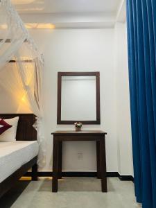 A bed or beds in a room at Cinnamon City