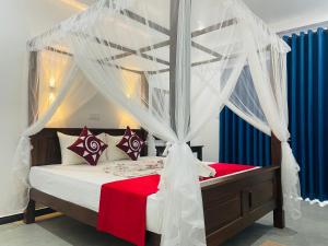 A bed or beds in a room at Cinnamon City