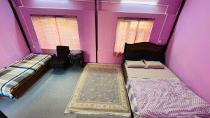 Una cama o camas en una habitación de Maa Buu Chhen