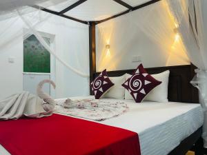 A bed or beds in a room at Cinnamon City