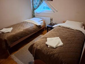 Postel nebo postele na pokoji v ubytování Hotel Koliba na Grza