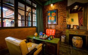 Posezení v ubytování Shaxi absolute art absolute B & B
