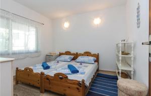Posteľ alebo postele v izbe v ubytovaní Holiday Home Privlaka Put Grzanove Punte