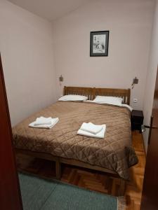 Postel nebo postele na pokoji v ubytování Hotel Koliba na Grza