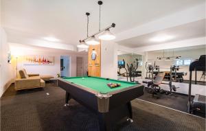 a living room with a pool table in it at Villa Michelle in Maslenica