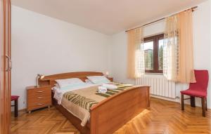 Postel nebo postele na pokoji v ubytování Holiday Home Privlaka 03