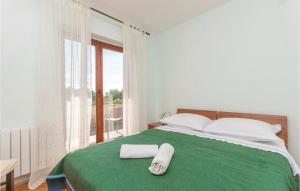 Postel nebo postele na pokoji v ubytování Holiday Home Privlaka 03